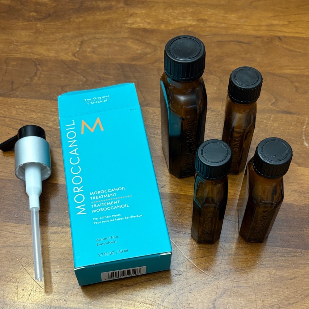 Empty Brown Bottles from morrocanoil hair treatment.